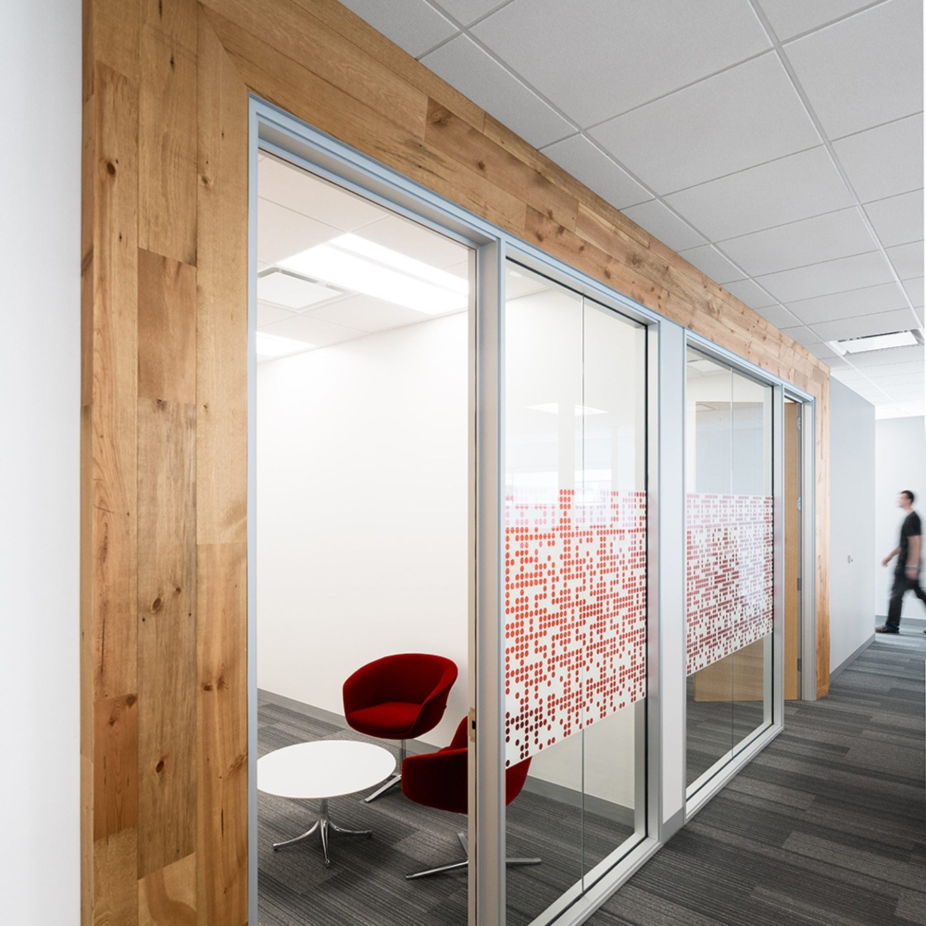 Golden Oak Stikwood real wood planks in a commercial hallway, representing Indoor Advantage Gold certified wood walls