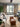 Living room with Stikwood barn door hardware as window coverings