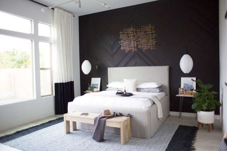 Bright modern bedroom with natural light, neutral tones, and stylish decor creating a cozy and inviting space