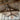 Elements reclaimed weathered wood planks on a rustic vaulted ceiling