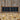 Detail of Elements reclaimed weathered wood siding on a rustic equestrian barn