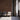 Reclaimed Barrel Oak wall planks behind three chairs and an open doorway