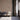 Waiting room with Sand Stone wood plank accent wall and three chairs