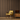 Yellow mid-century chair next to wooden cabinet with record player against a natural wood plank accent wall
