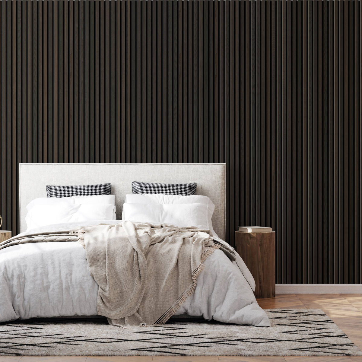 Bedroom with a wall of dark wood Slatwood Melody Acoustic Wall Panels behind the bed