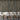 Reclaimed Weathered Wood Slatwood Chorus Acoustic Slat Panels behind a modern seating area