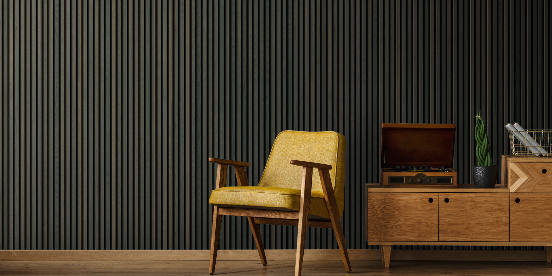 Cozy mid-century modern living space with yellow armchair, wooden sideboard, turntable, and dark vertical wood plank wall