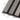 Close-up of Driftwood Slatwood Melody Acoustic Wall Panels, showing wood grain and acoustic felt