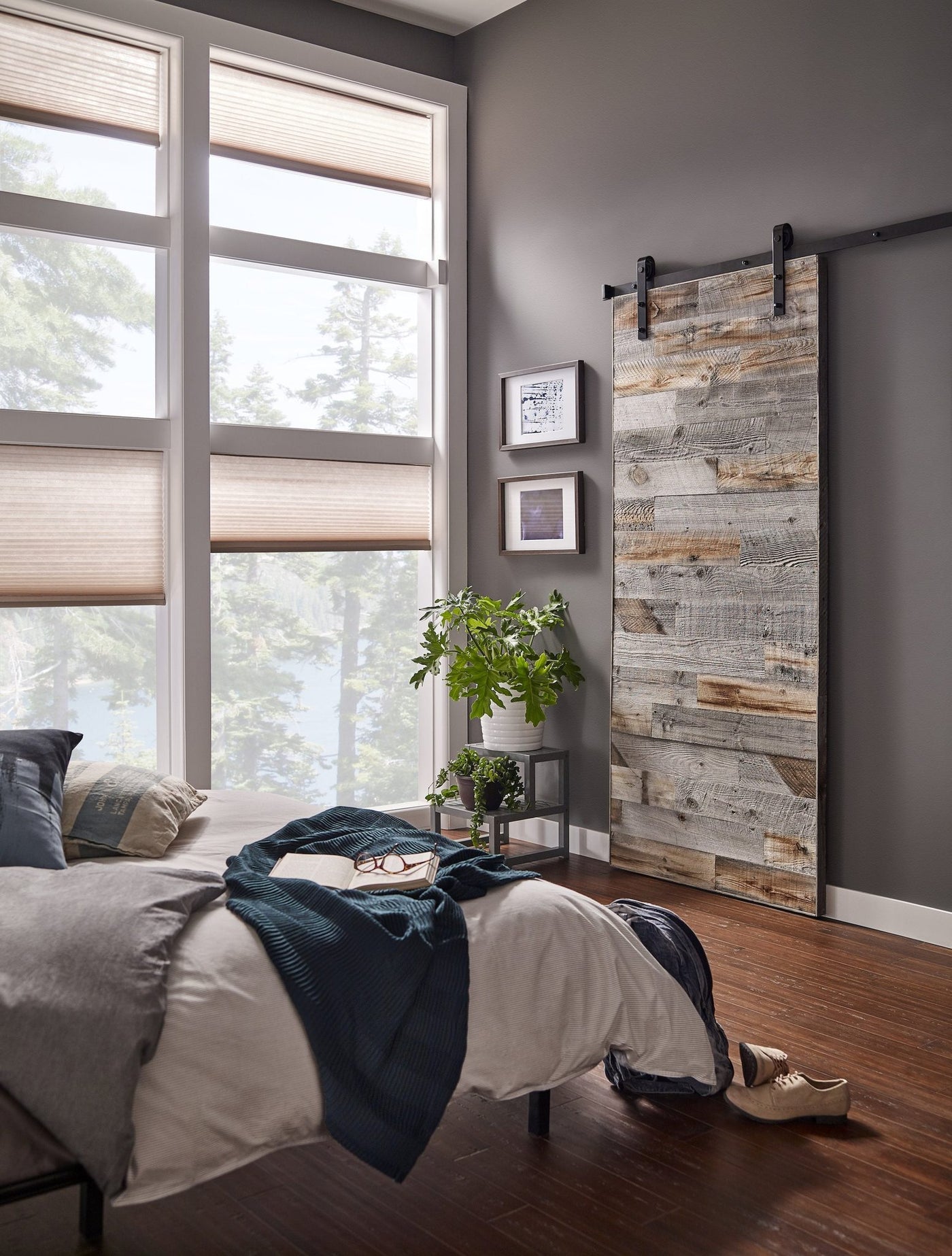 Bedroom scene with Stikits Interior Barn Door made of reclaimed wood planks