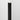 Charcoal Peel & Stick Wood Corner Trim Sample on a white wall