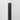 Graystone Peel & Stick Wood Corner Trim piece installed in the corner of a white wall