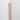 Minimalist Fir Peel & Stick Wood Corner Trim Sample on a white wall