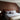 Bedroom with Reclaimed Barrel Oak planks as accent wall behind the bed