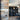 Reclaimed Sierra Silver planks on a wall in a retail store setting