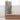 Stikwood peel-and-stick wood planks in reclaimed weathered finish, displayed with product packaging
