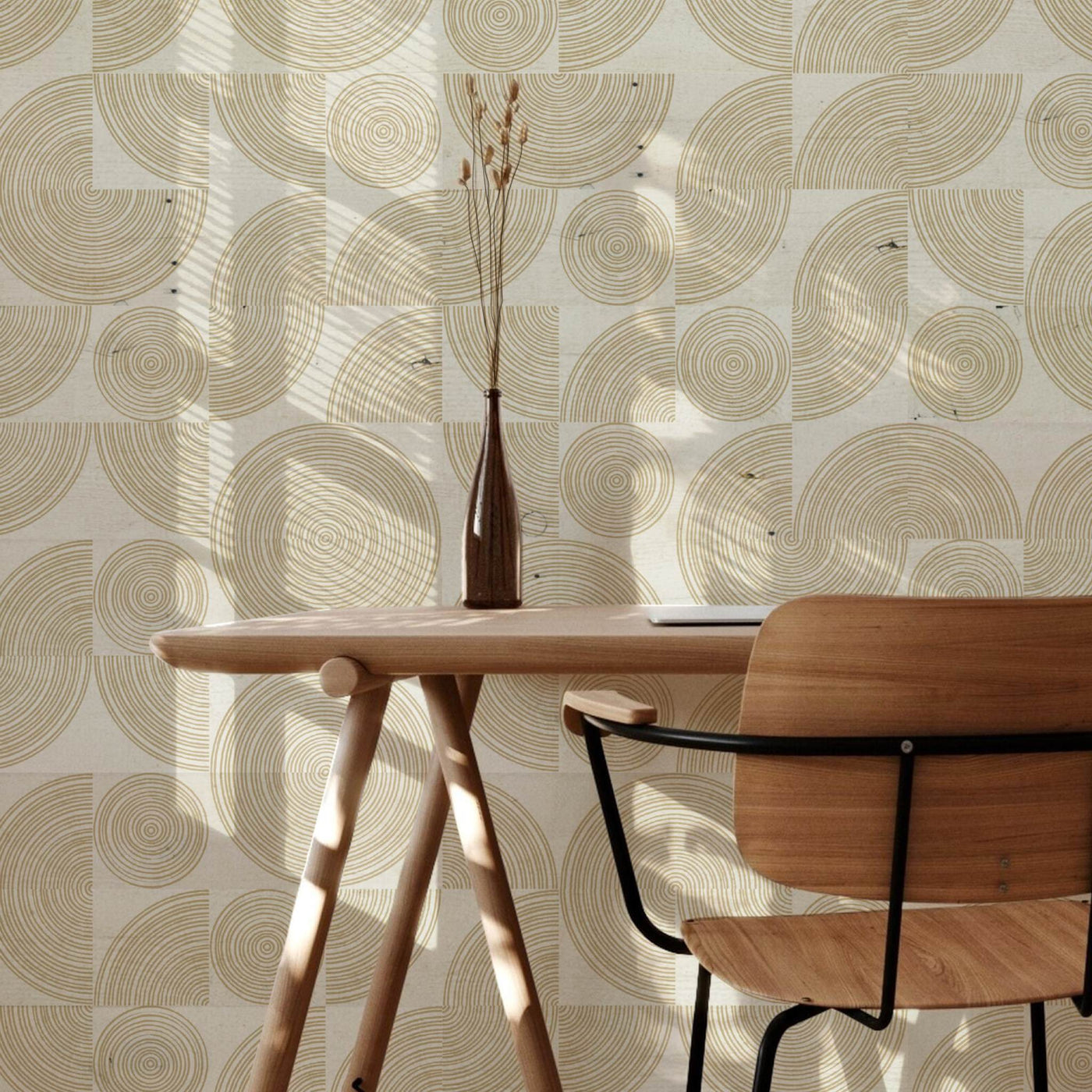 Rings Peel & Stick Wood Wall Planks as backdrop for desk with vase and chair