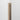 Sand Stone Peel & Stick Wood Corner Trim Sample on a wall corner