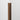 Vertical Grain Arabica Peel & Stick Wood Corner Trim piece on a white wall