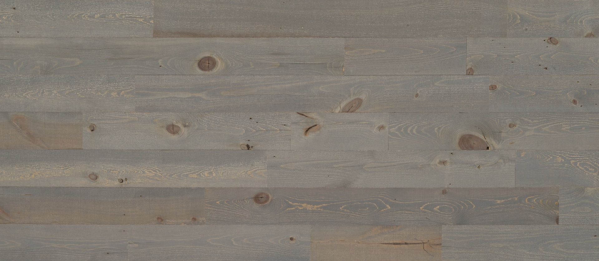 Natural peel and stick real wood planks in soft gray tones perfect for creating a stylish accent wall