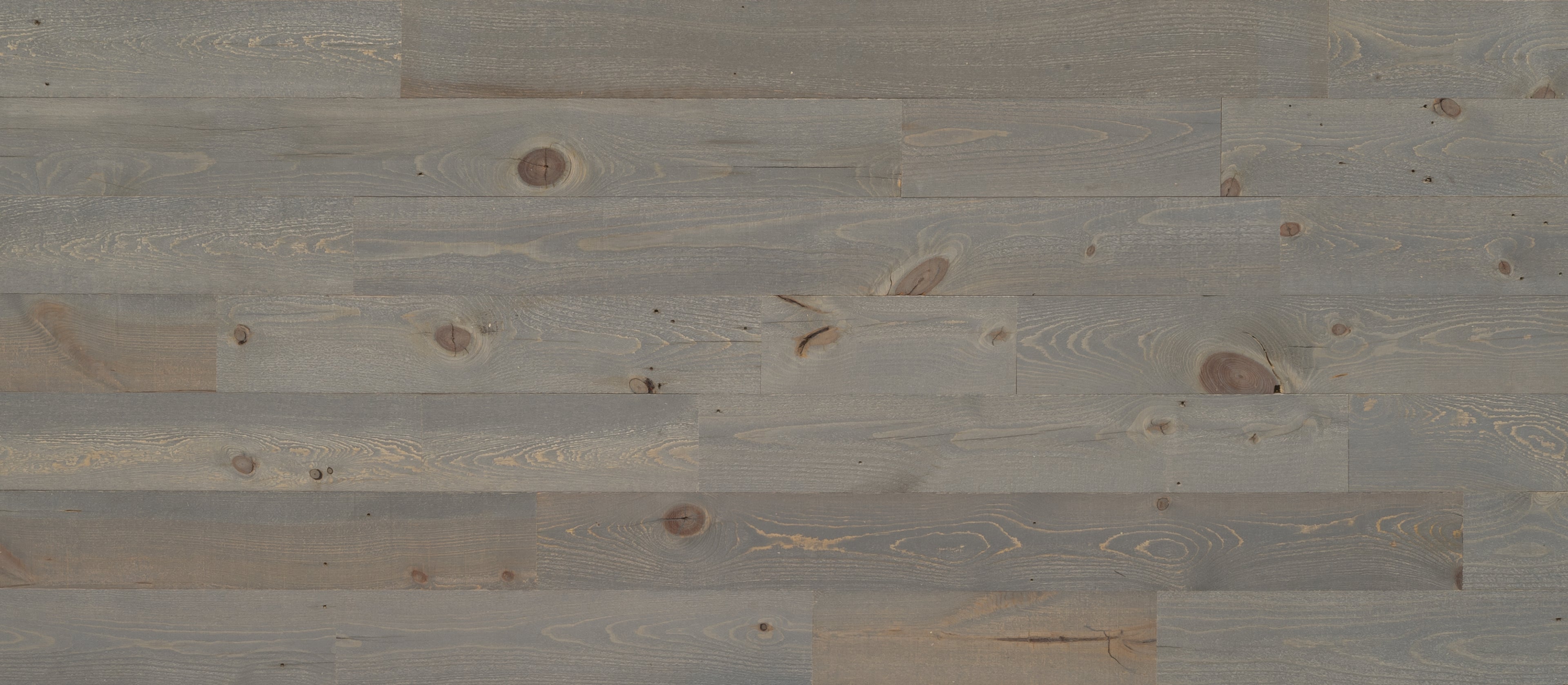 Natural peel and stick real wood planks in soft gray tones perfect for creating a stylish accent wall