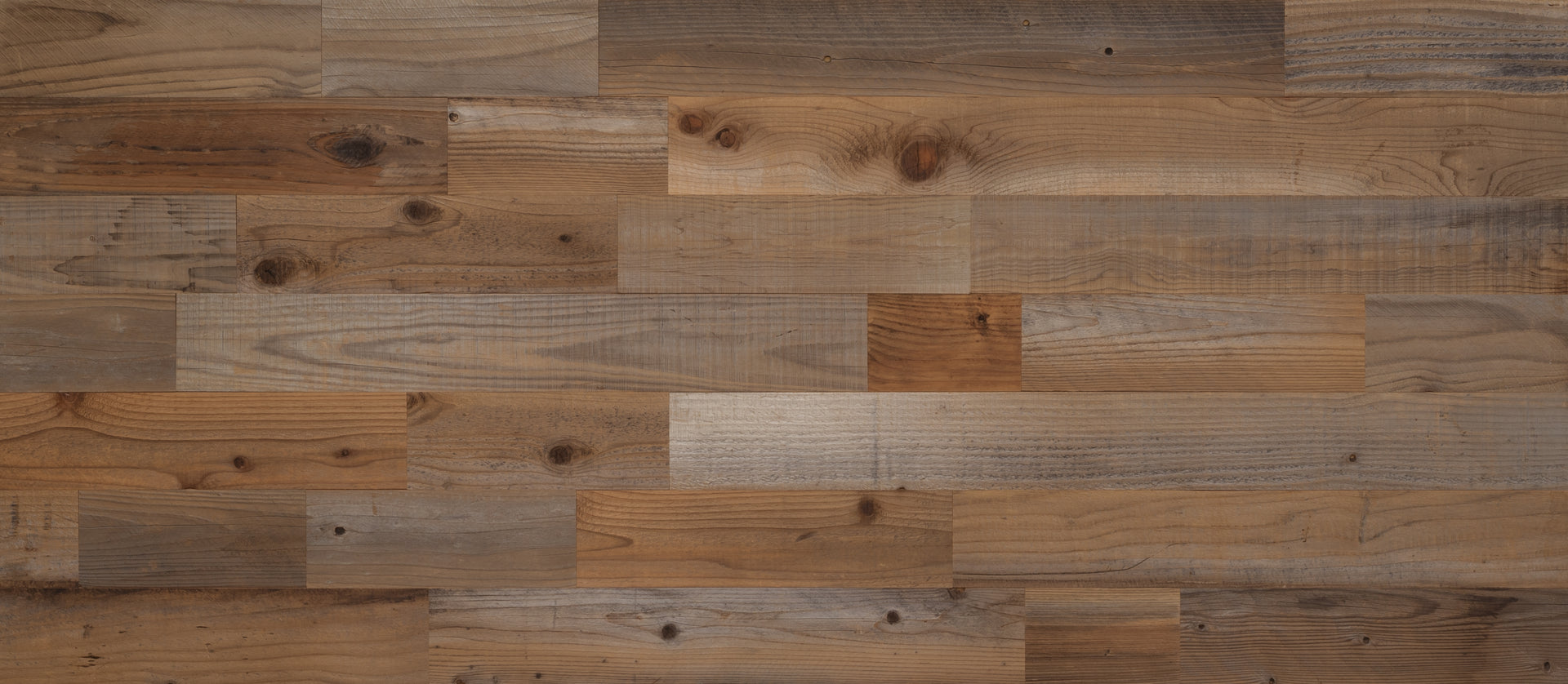 Natural wood plank wall with varied tones and textures creating a warm and rustic peel and stick accent surface