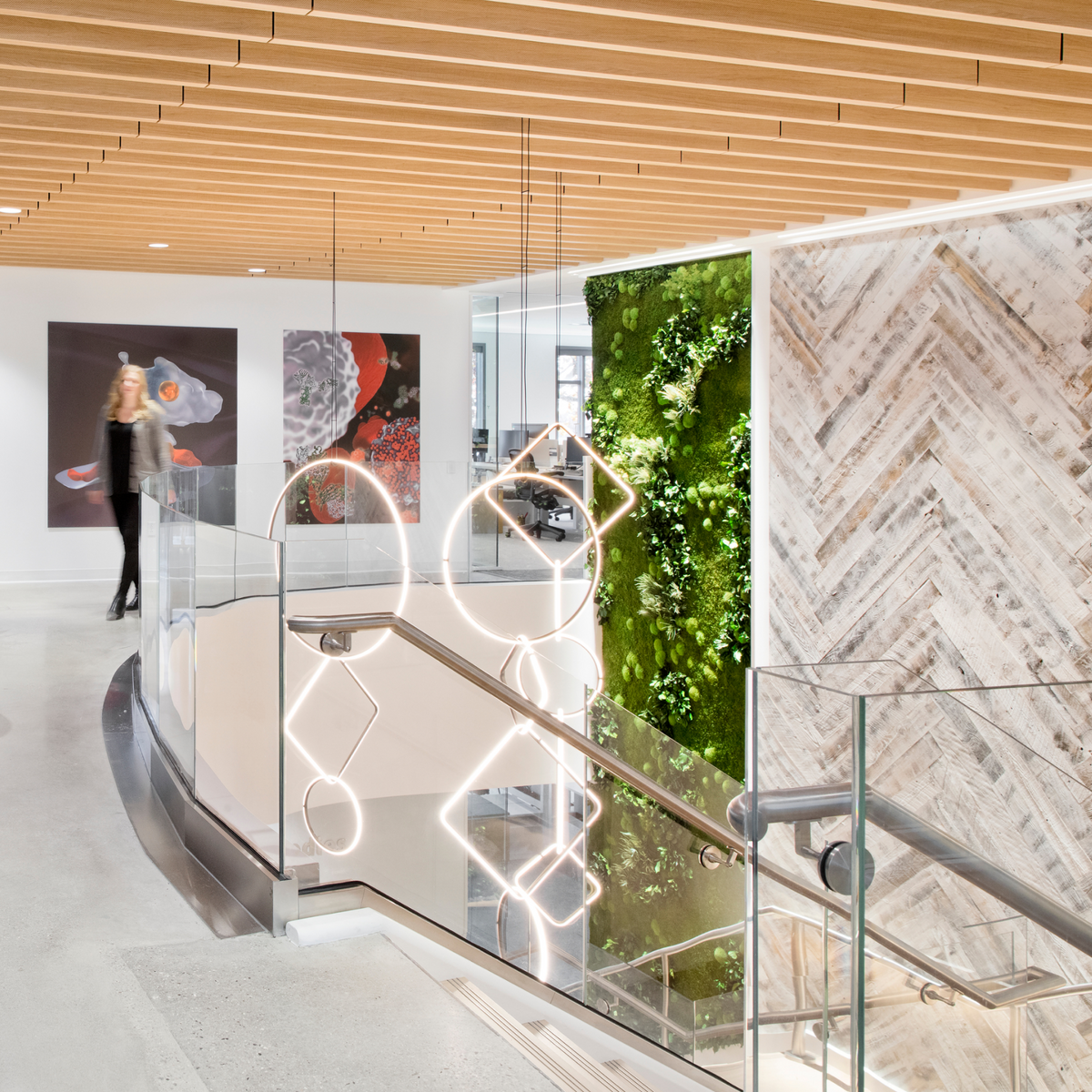 modern office with stikwood reclaimed weathered wood white chevron patterned wall