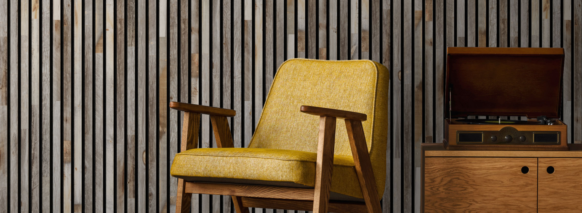 Cozy mustard yellow armchair with wooden arms next to a vintage record player against a natural wood plank accent wall