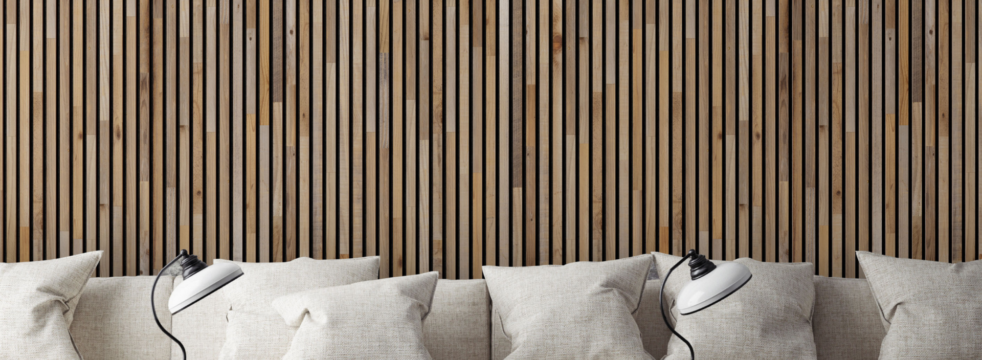 Modern living space with a natural wood plank accent wall and a light beige sofa topped with soft pillows