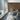 Conference room with a wall covered in Ashlar2 Buckskin mosaic wood tiles