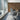 Conference room with a wall covered in Chevron Buckskin Mosaic Wood Wall Tiles