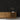 Cobblestone Ember Mosaic Wood Wall Tiles behind a wooden console table with vases and books