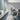 Conference room with a wall clad in Chevron Glacier Mosaic Wood Wall Tiles