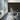 Conference room with a wall covered in Cobblestone Gunstock Mosaic Wood Wall Tiles