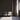 Wall of Grid Gunstock mosaic wood tiles behind three chairs