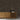 Grid Gunstock Mosaic Wood Wall Tiles behind a wooden console table