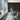 Conference room with a wall clad in Stacked Gunstock Mosaic Wood Wall Tiles