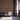 Brick Natural Mosaic Wood Wall Tiles behind three chairs and an open doorway
