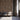 Waiting room with Chevron Natural Mosaic Wood Wall Tiles behind three chairs