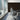Conference room with a wall covered in Hardwood Brick Walnut mosaic wood tiles