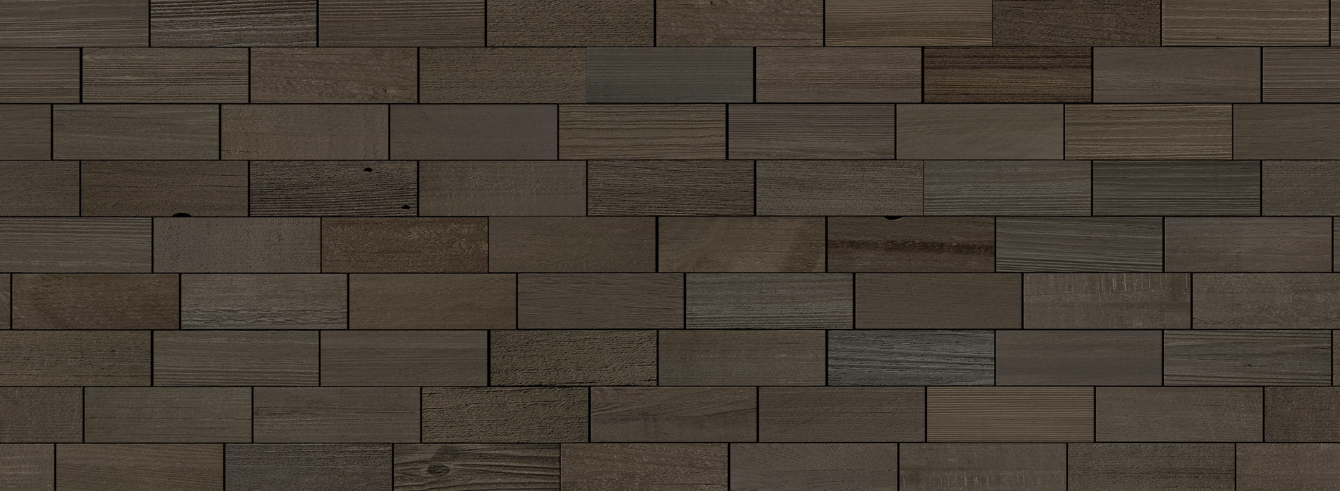 Dark natural wood plank wall with varied tones creating a textured peel and stick real wood accent surface