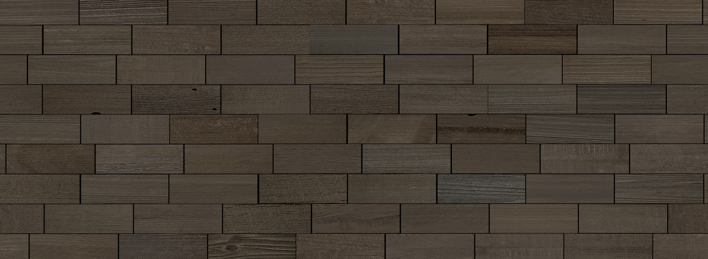 Dark natural wood plank wall with varied tones creating a textured peel and stick real wood accent surface
