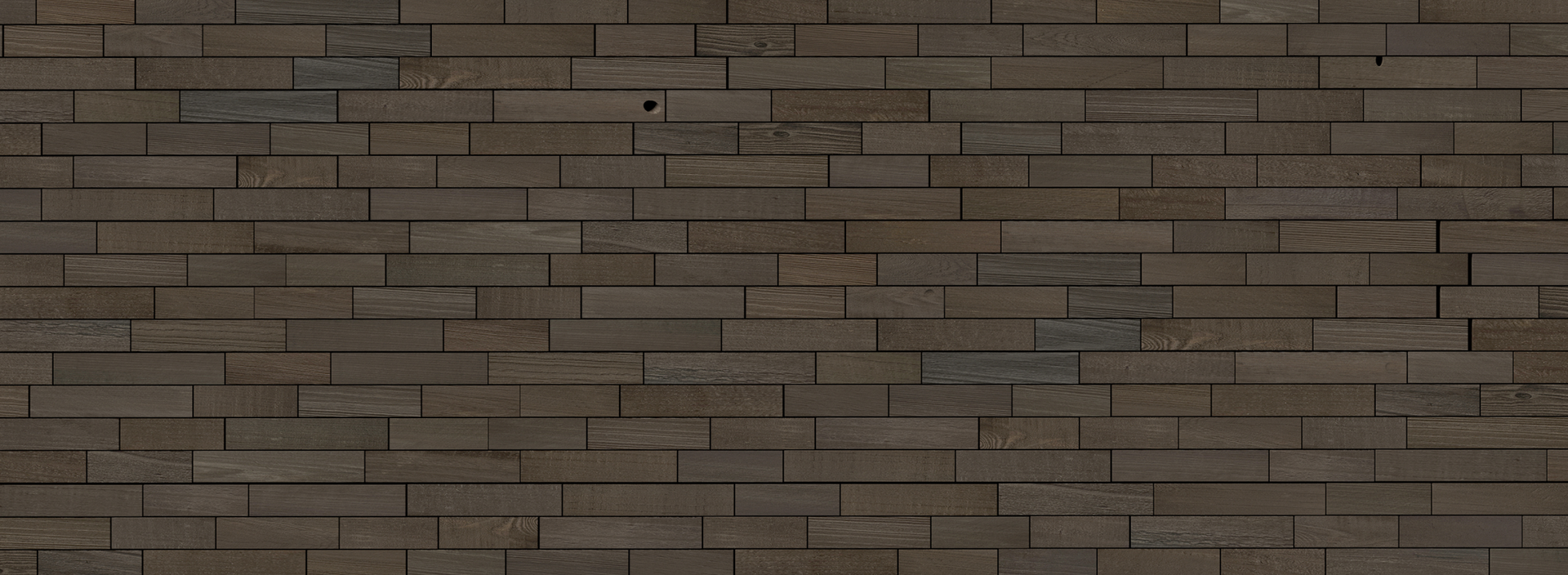 Dark natural wood plank wall creating a sleek peel and stick real wood feature wall with subtle texture variations