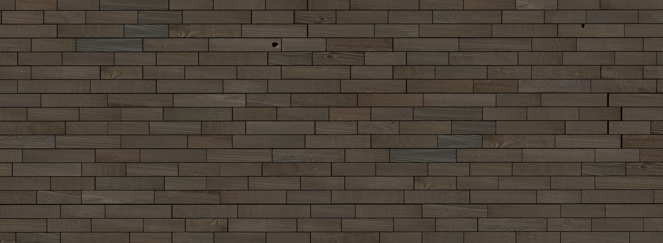 Dark natural wood plank wall creating a sleek peel and stick real wood feature wall with subtle texture variations
