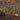 Ashlar2 Buckskin mosaic wood tiles on a wall, with vases and a bowl on a wood credenza