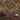 Chevron Buckskin Mosaic Wood Wall Tiles in a herringbone pattern on a wall