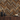 Chevron pattern natural wood plank wall with varied warm tones and textured reclaimed wood blocks