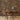 Stacked Buckskin Mosaic Wood Wall Tiles behind a desk and chair in an office setting
