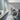 Conference room with Brick Glacier Mosaic Wood Wall Tiles behind a table and chairs