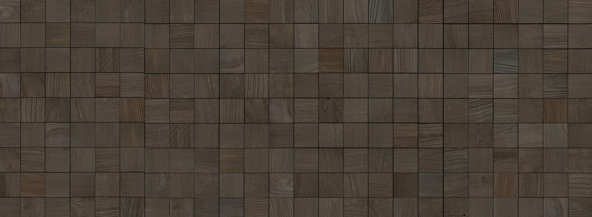 Close-up of natural dark wood plank squares arranged in a textured pattern for a peel and stick accent wall