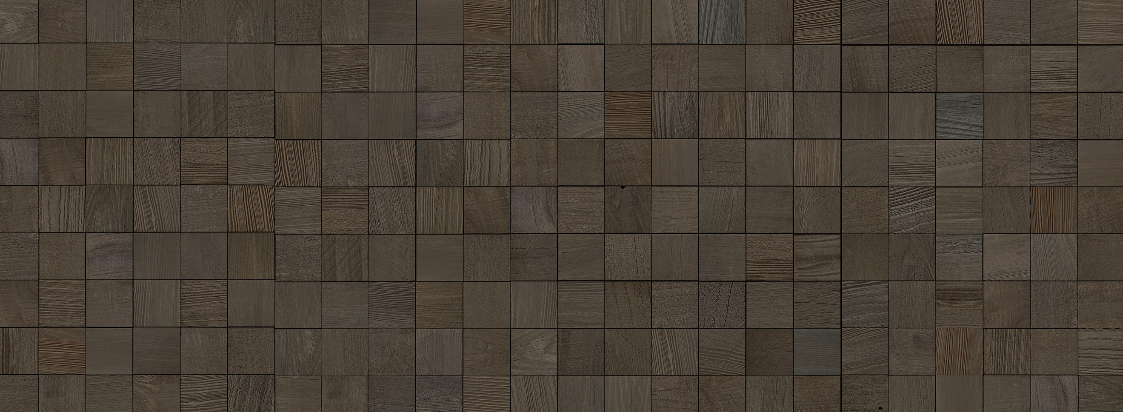 Close-up of natural dark wood plank squares arranged in a textured pattern for a peel and stick accent wall